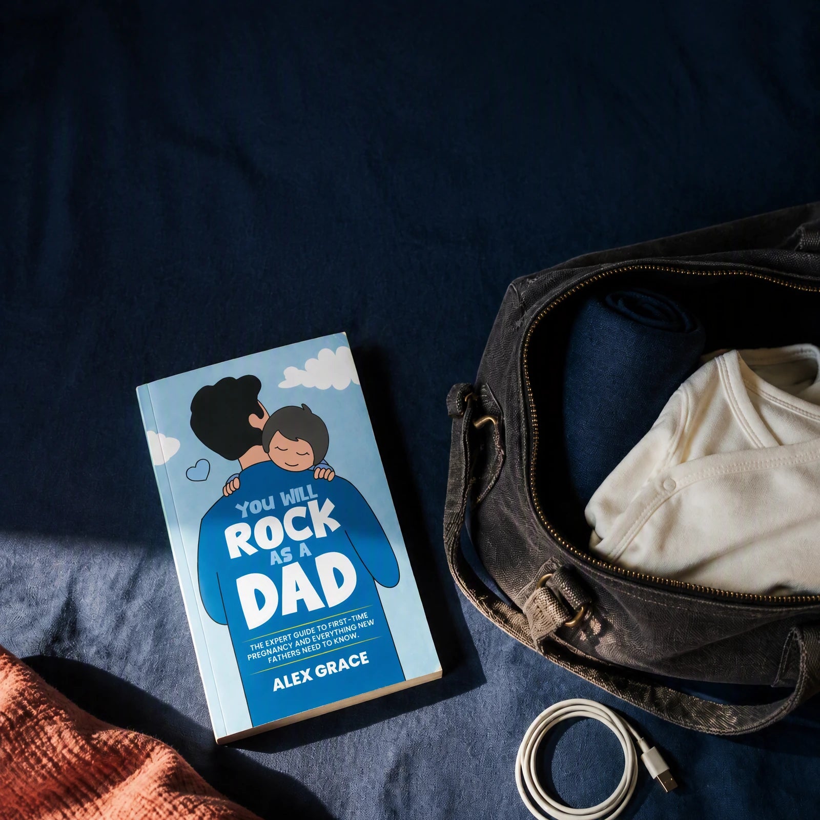 Dad Volume 1 ready to read beside an overnight bag