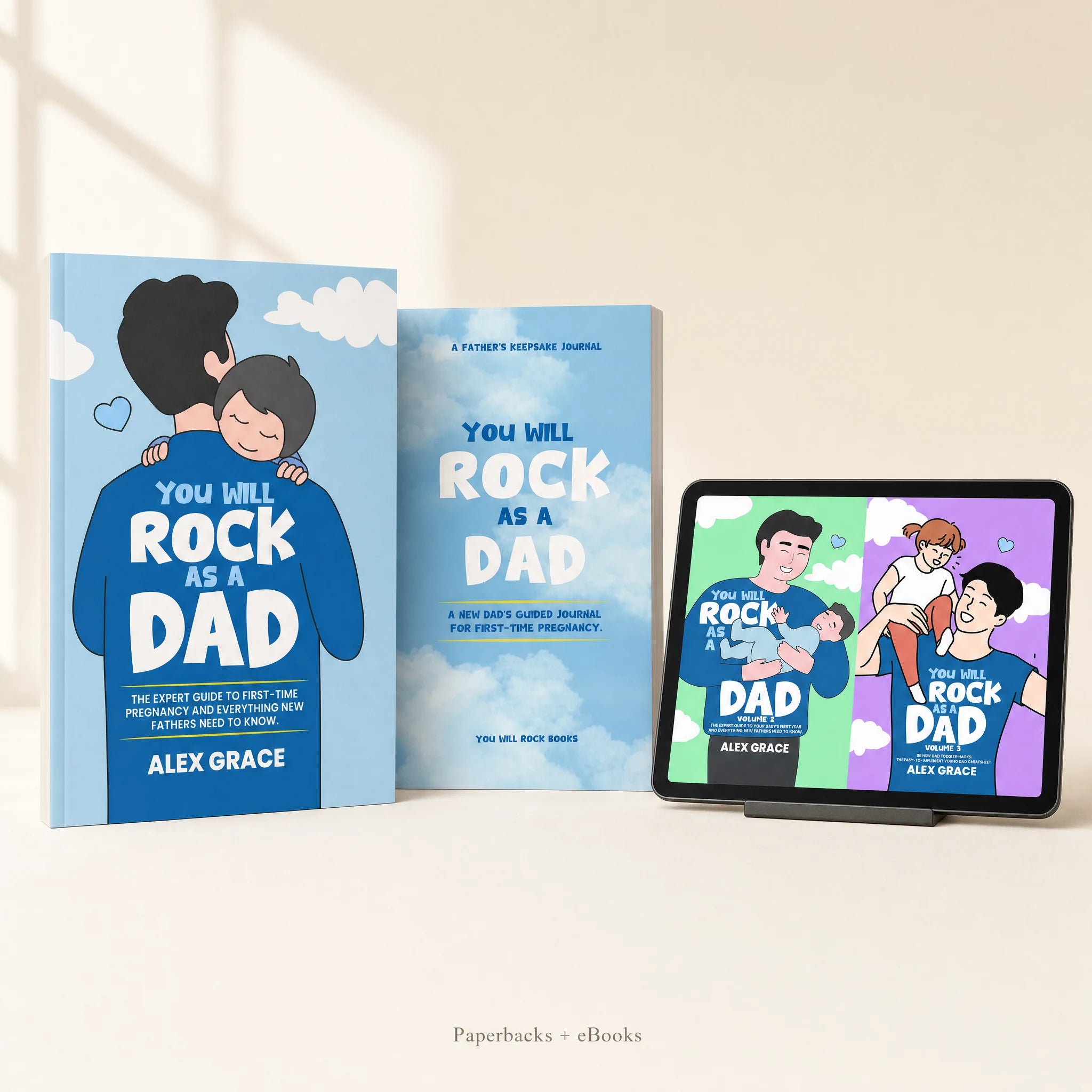 Dad Volume 1 paperback and physical guided journal beside Dad Volumes 2–3 shown as EPUB eBooks on a screen